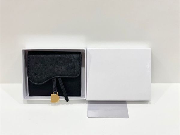 

made of printed fabric and sheepskin, it is durable. it has a spacious main compartment, two wiring bags and two card slots for cash, bills, Red;black