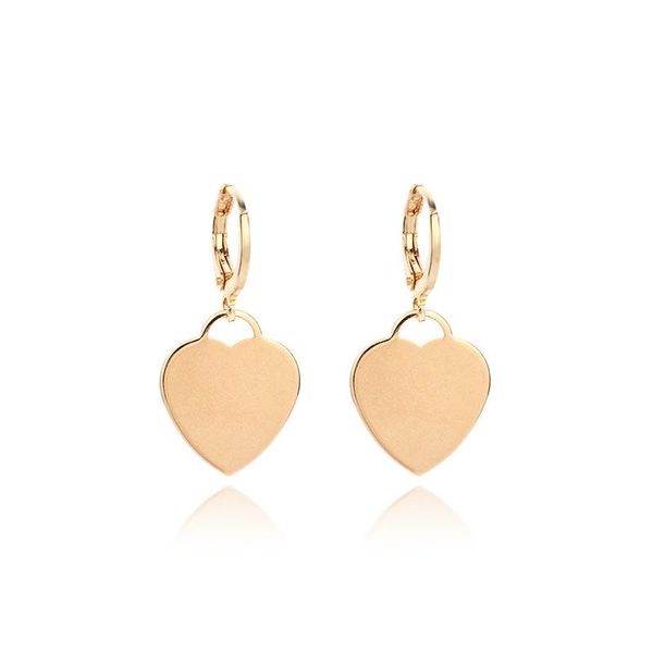 Stud haute qualité bijoux femme Simple doré métal paillettes amour coeur boucles d'oreilles vente belle gracieuse filles cadeau accessoires