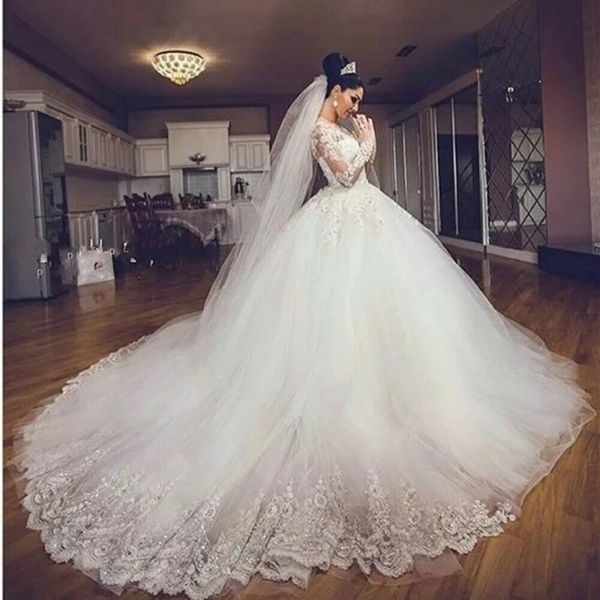 

2021 new dubai elegant long sleeves ball gown wedding dresses sheer crew neck lace appliques beaded vestios de novia bridal gowns, White