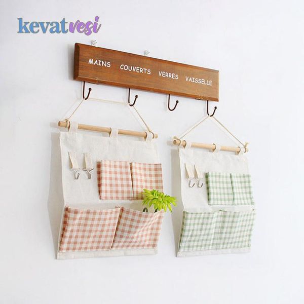 

hanging storage bag with 4 pocket 2 hooks wall mounted wardrobe organizer cosmetics keys waterproof boxes & bins