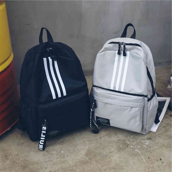

wind backpack men's large capacity couple university high school student schoolbag campus travel trend backpack