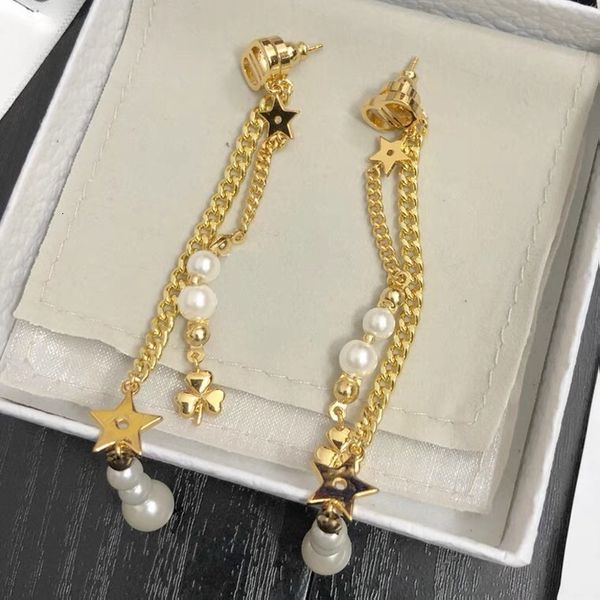

d's clover pearl tassel earrings 925 sier needle female cd, Golden