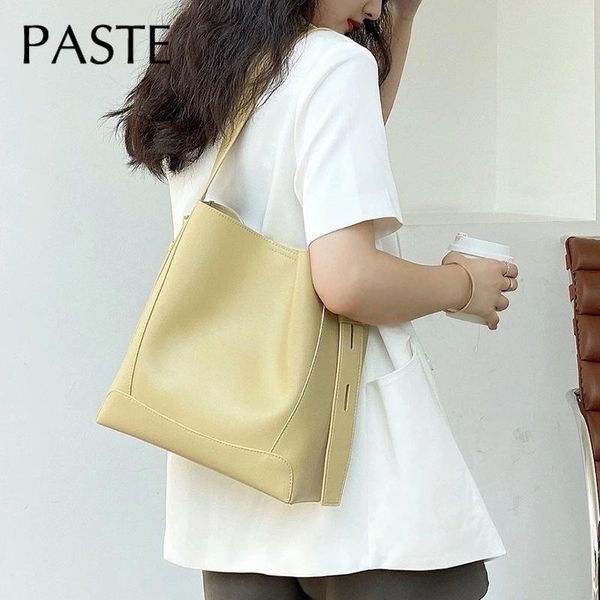 

evening bags simple niche design light yellow bucket bag cowhide leather adjustable women shoulder large commuter tote