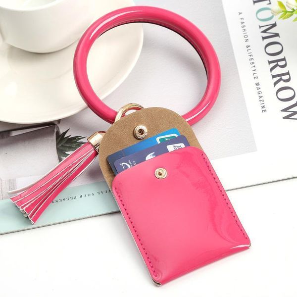 Sacos de armazenamento 50 pçs / lote keychain pulseira pulseira pulseira pulseira brilhante faux couro mulheres meninas mini bolsa borla cor sólida chaveiro bolsa de moeda