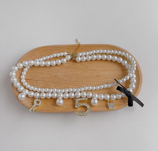 

2021 europe and america full diamond key lock necklace bowknot pearl clavicle chain female fast delivery, Silver