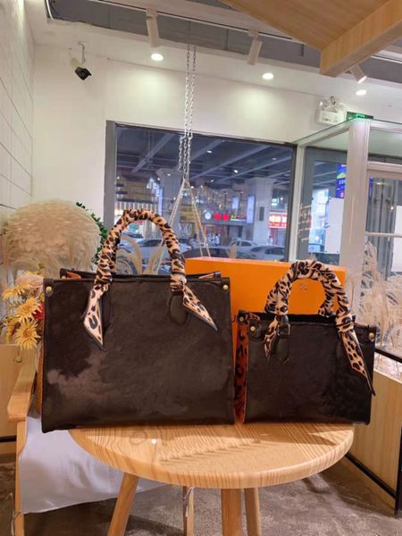 

designer designs handbag mommy shopping bag. pure black cowhide leopard color.