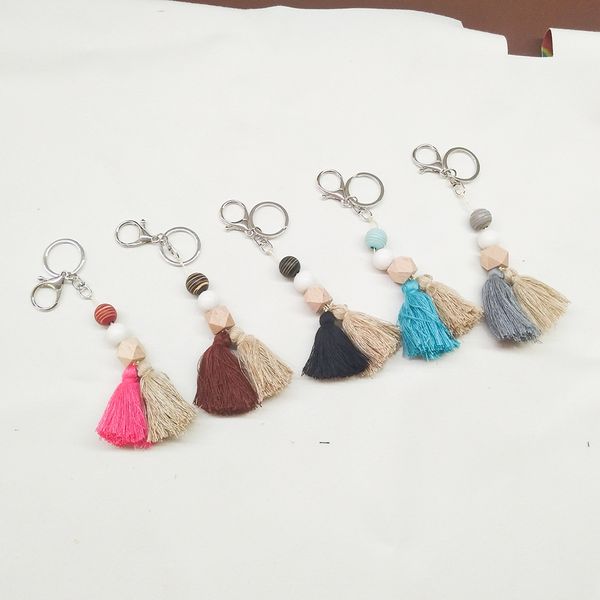 

foreign trade carved beaded wooden bead keychain personality two-color cotton tassel pendant key ring wholesale multi-color optional, Silver