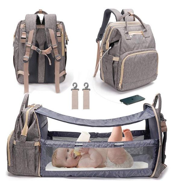 

diaper bags 3 in 1 travel bassinet foldable baby bed, bag backpack changing station, waterproof, usb charging port, portable crib