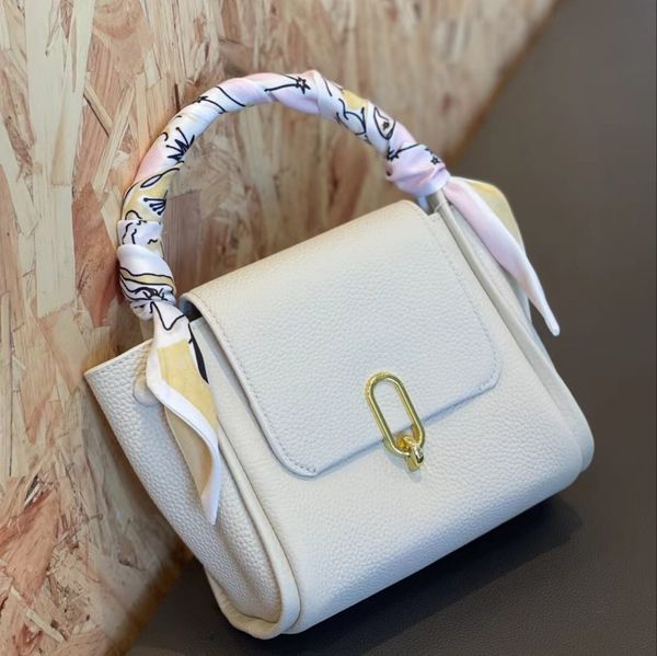 

2021 niche leather handbag togo head layer cowhide korean fashion one shoulder women s bag simple trend slant span bag