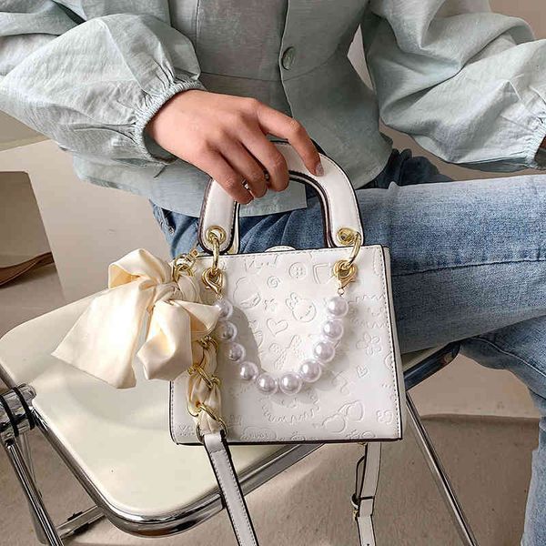 

red 2021 new fashion net embossed pearl hand-held one shoulder messenger bag foreign fairy diana