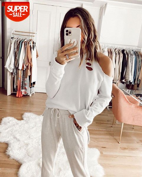 

[in stock]european and american women's fashion white off-the-shoulder ripped round neck t-shirt trend #9l76