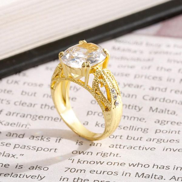 

wedding rings classic fashion ladies gold color inlaid egg-shaped white hollow design ring whole sale jewelry, Slivery;golden