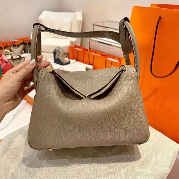 

brand 2021 new multifunctional mother cowhide doctor bag one shoulder portable