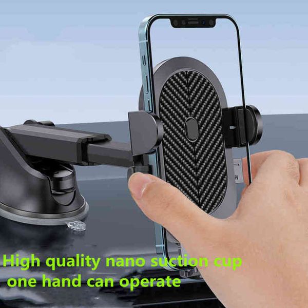 

new car mounted suction cup type carbon fiber one key lock mobile phone bracket car air conditioner outlet navigation mobile phone bracket x