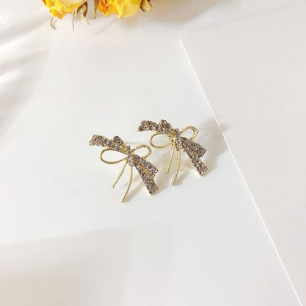 

stud dominated women the girl temperament bowknot earrings delicate bright irregular design feeling, Golden;silver