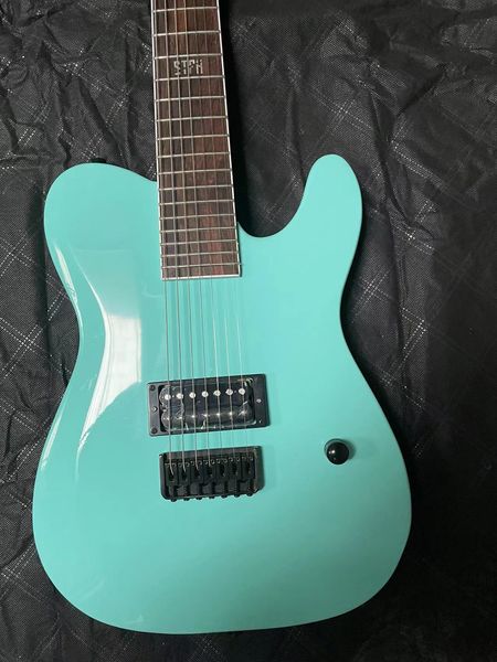 

six string green tl electric guitar. we can customize any style of electric guitar and bass guitar