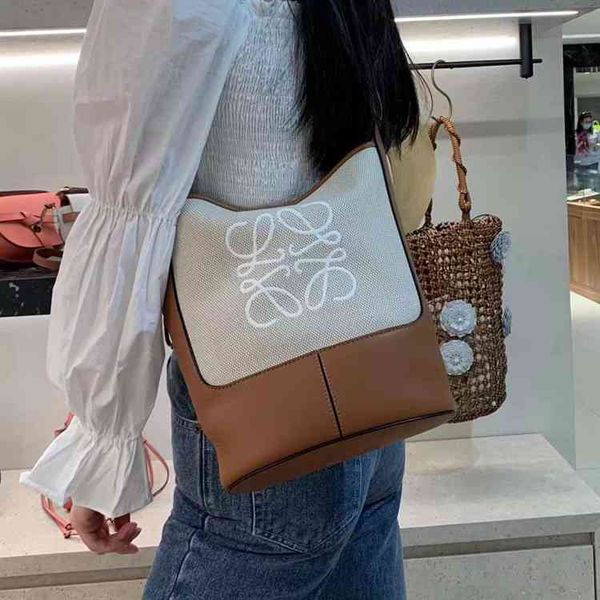 

holderloewe / luo yiwei hobo anagram canvas leather bucket one shoulder straddle women's bag oeinhandbag hook