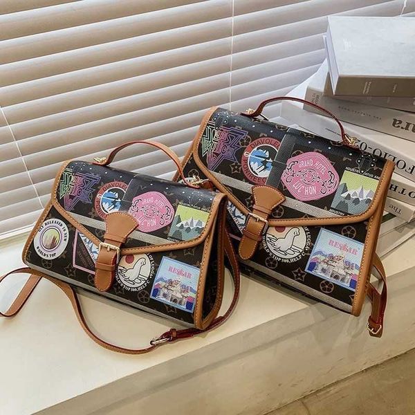 

wholesale versatile graffiti 2021 postman's large capacity portable one shoulder messenger bag for female students luxuryss designerss