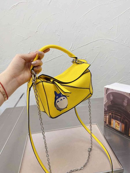 

luxurys designers bag loew mini puzzle mini geometric bag chinchilla print yellow geometric puzzle bag chain strap ysj