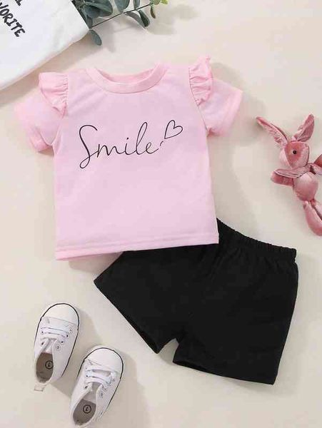 

baby letter graphic ruffle trim tee & shorts she, White