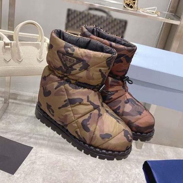 

womens designer boots booties the eiderdown comfort boot warm winter comes in water-repellent with down filling and can be worn outdoors as, Black