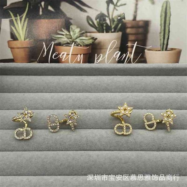 

2021 new designer family earrings, star chains, diamond women's net red, Golden