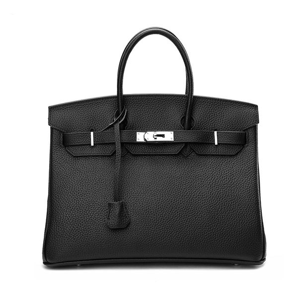 

new head leather bag large capacity silver button handbag leather women's shoulder bag