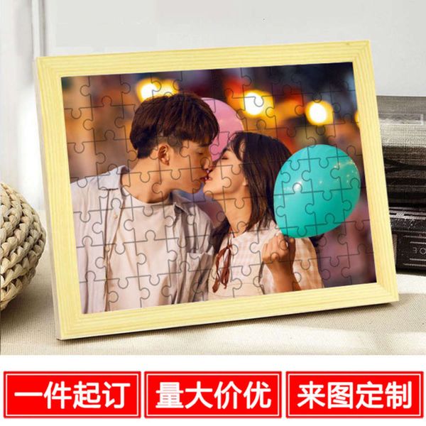 

toy jigsaw puzzle with po frame, pieces of wood, adult
