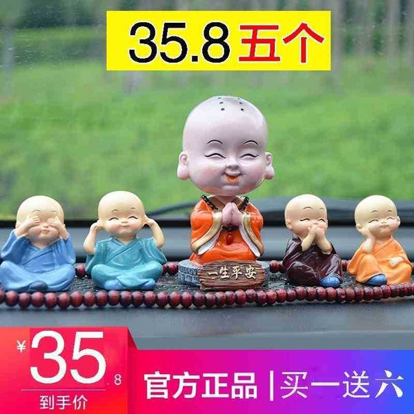 

creative shaking head doll in the car ornaments buddha central console lovely little monk