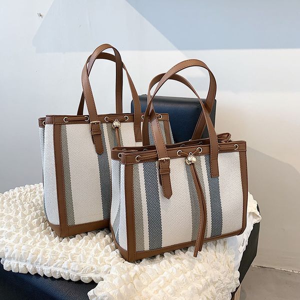 

luxury handbags female 2021 new trendy korean portable mommy bag large capacity canvas contrast stripe one shoulder tote bag