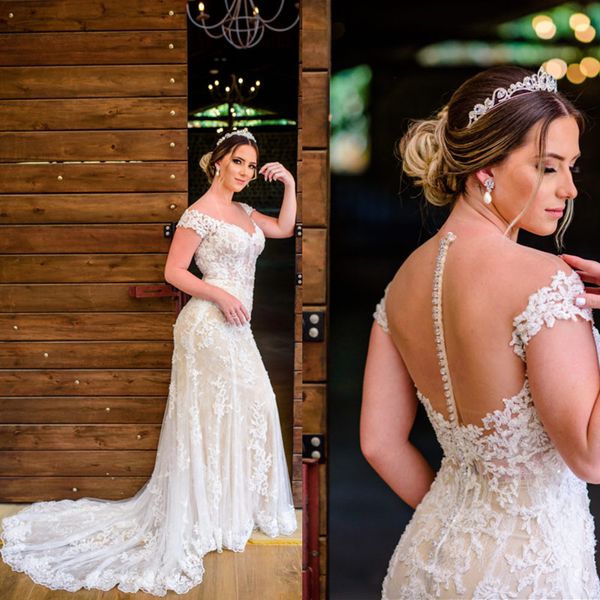 Abito da sposa taglie forti con maniche ad aletta e bottoni di perle profonde Abiti da sposa country da spiaggia con applicazioni Vestido De Novia