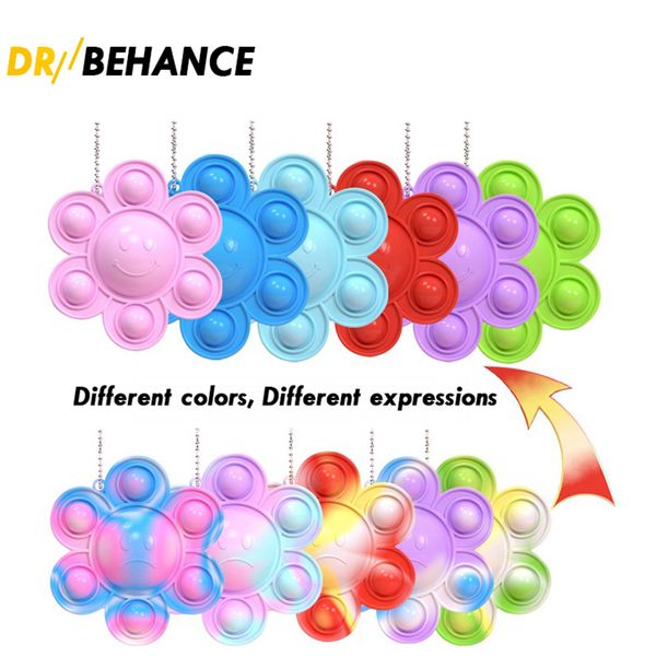 

2021 toy original factory fidget funny rainbow sunflower ocs expression flip doll silicone decompression pendant toys 6 color