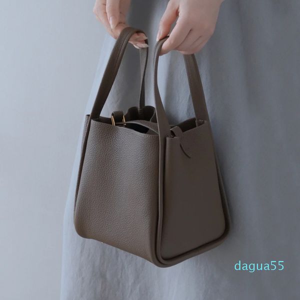 

60% off outlet store 2021 new autumn and winter niche designer korean vegetable basket bag, female hand layer cowhide portable bucket ba