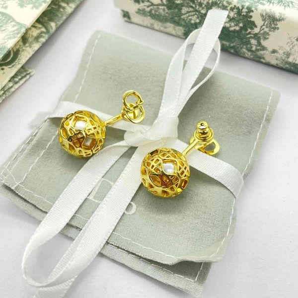

design jewelry family letter classic spherical rattan hollowed out pearl earrings, women wearing light luxury earrings before and, Silver