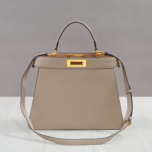 

design 2021 new women's leather hand lock shoulder messenger kitten bag fashion versatile bag rmrx