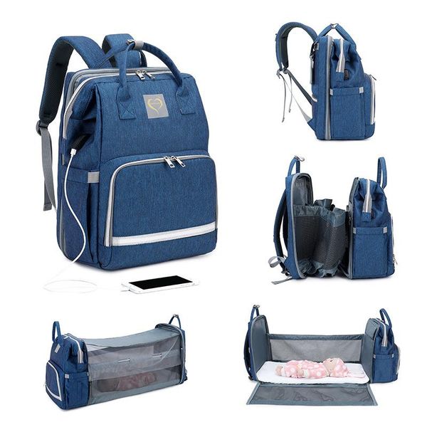 

diaper bags 2021 fashion portable folding crib bag multi-function large capacity baby backpack