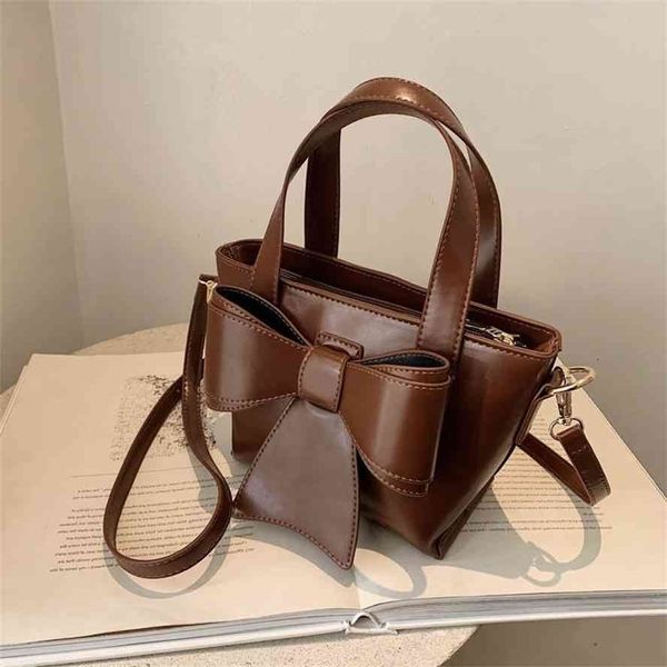 

handbaghandbagwomen's new 2020 fashion handbag bowknot casual one shoulder slung solid color bucket baggg baggg bag