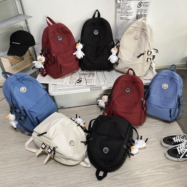 

school bags cute large capacity women's backpack nylon waterproof student bag pure color simple travel 2021