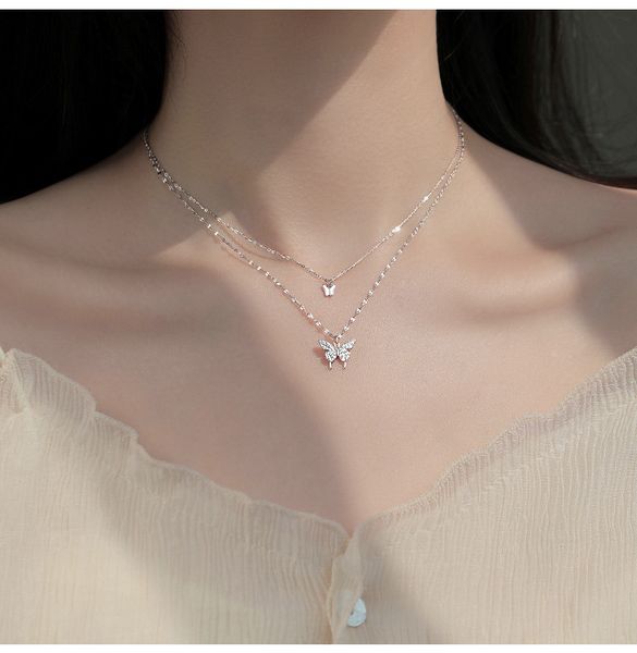 Collana con nappa a farfalla lucida in argento Collana con ciondolo a doppio strato squisita femminile Gioielli per feste di nozze con catena a clavicola