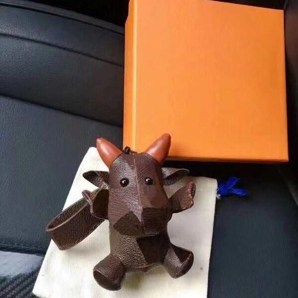 

2021 cattle keychains year of the ox with letters pattern keychain fashion bags doll chains for wholesale unisex, Silver