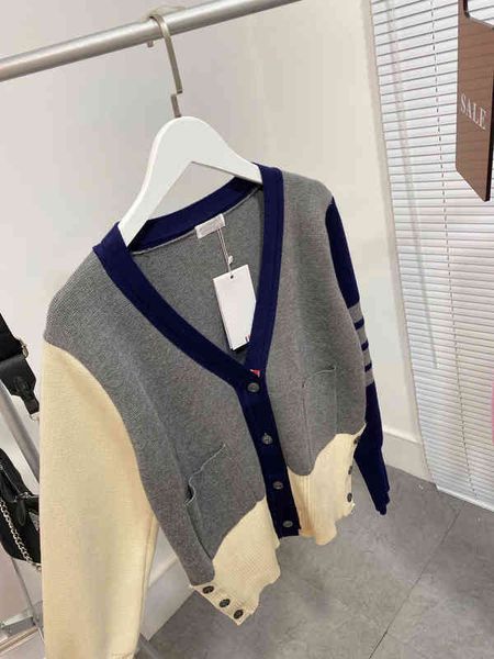 

2022 factory wholesale new model sweater female v-neck cardigan couple casual loose long sleeve buckle four bar splicing coat, White;black