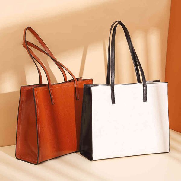 

autumn and winter 2020 new leather women's bag large capacity hand fashion contrast leather shoulder bag