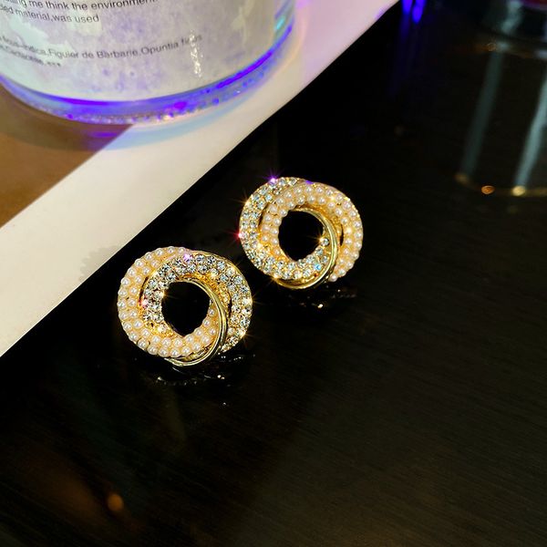 

925 silver needle inlaid with diamond pearl winding geometric earrings