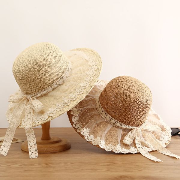 Elegante cappello di paglia da donna Lolita Cappellino estivo per protezione solare all'aperto Cappellino per vacanze in spiaggia Cappellino con fiocco in pizzo Cappelli a tesa larga da sposa fatti a mano