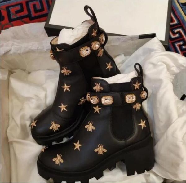 

2021 winter low barrel round head thick heel rivet black european and american ultra high heel solid color female martin boots