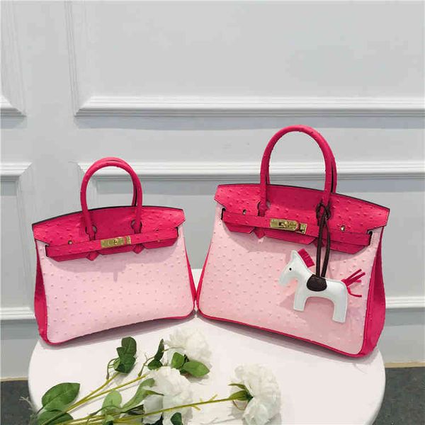 

designer bag with ostrich pattern and color contrast