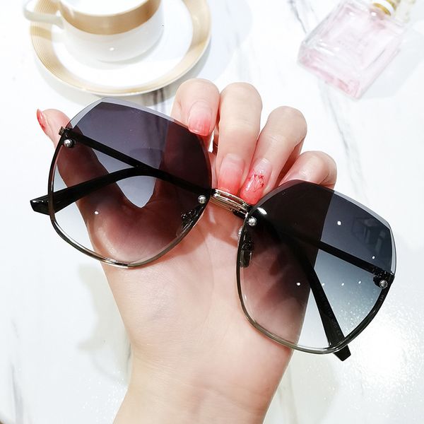 

2021 metal frameless fashion trend glasses trimming polygonal women's sunglasses