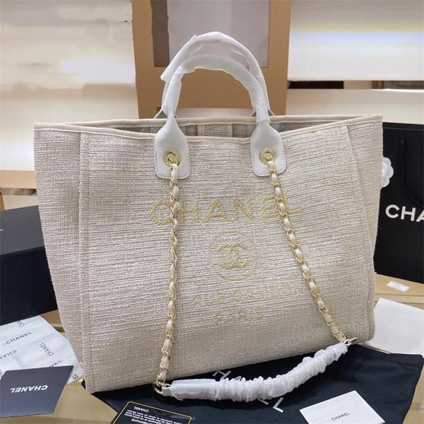 

brand designer totes bag 2021 trendy summer beach famous shoulder handbags with gold chain 001