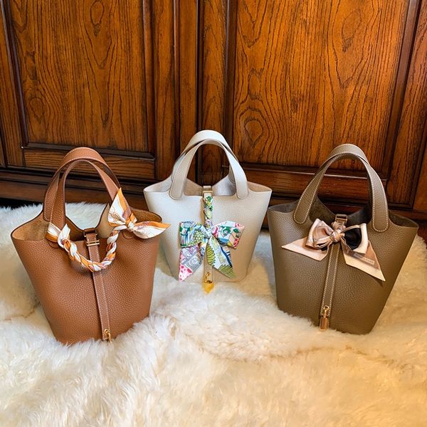 

2021 new bag treasure treasure basket handbag first layer cowhide bucket luxury lady designer fashion diagonal bag cinderella princess