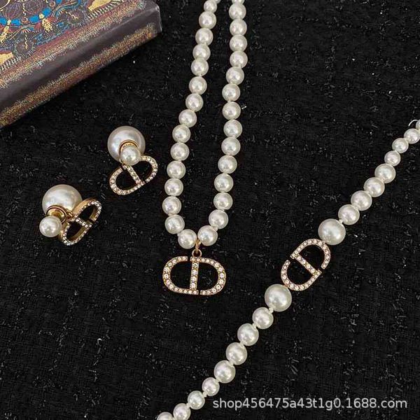 

dio/christian d / di family korean style inlaid brick earrings star same cd letter pearl earrings female s925 silver needle, Red;brown